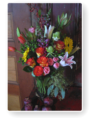 a cozy flower shop filled with colorful floral arrangements